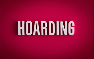 Hoarding sign lettering on a colored background