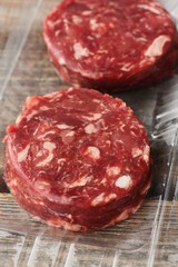 Cutlets from fresh beef meat for the grill