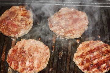 Delicious beef steaks on the grill