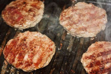 Delicious beef steaks on the grill