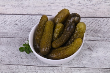 Pickled cucumbers heap in the bowl
