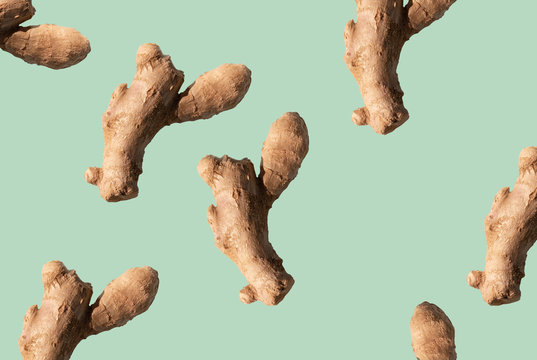 ginger root on green background