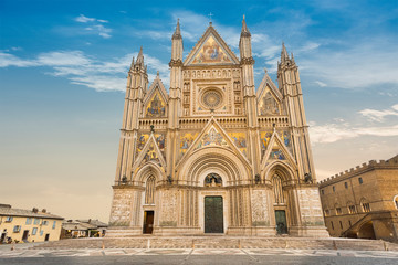 Exterior view of Orvieto Cathedral in the cathedral square, a 14th-century Gothic cathedral in...