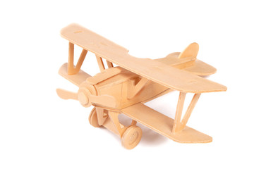 wooden biplane plane on a white background. Games for boys, children's creativity, handmade....