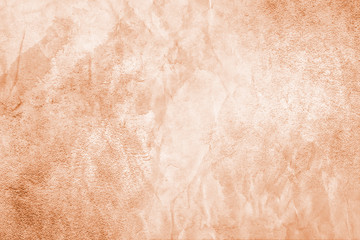 Handmade peachy texture. Crafted grunge background.
