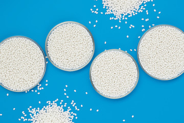 Top view of glass chemical bowls for experiments with granules