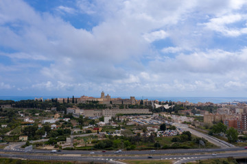 Fototapeta na wymiar Aerial drone photo of a beautiful medevil city in Spain with cloudy and blue sky