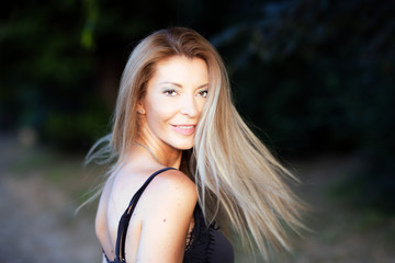 Naklejka premium beautiful blond girl iportrait outddoors