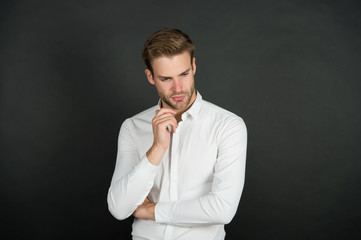 Mens personal care. Serious man dark background. Handsome guy with unshaven face. Skin care...