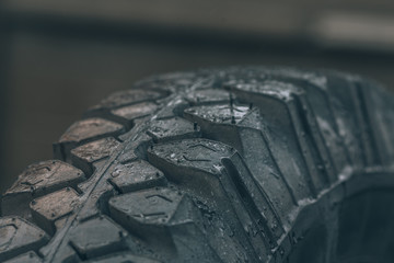 Offroad tire. The texture of the off-road wheel. Off-road rubber, wheel for a truck. © Simon