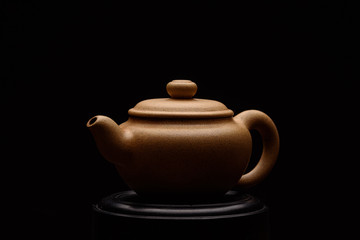 Chinese teapot on a black background