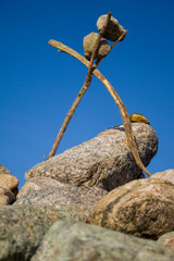 strange construction of sticks and stones