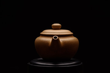 Chinese teapot on a black background
