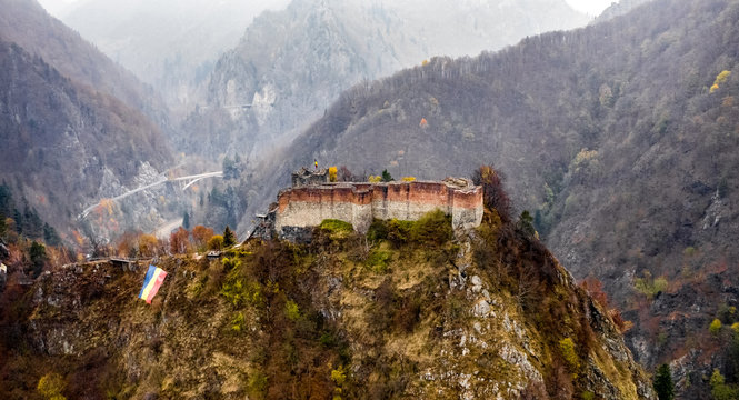 Ruined Poenari Castle in romania mountains
