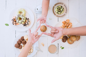 Coffee and cookies hand take a photo Top View Angle