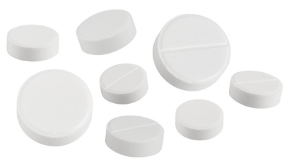 white textured pills isolated on white