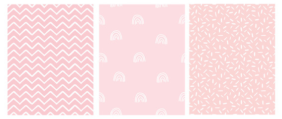 Abstract Hand Drawn Childish Style Seamless Vector Patterns. White Rainbows, Chevron and Spots on a Pink Background. Simple Irregular Childlike Geometric Vector Prints. Pastel Color Design.