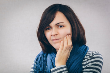 Closeup portrait young woman with sensitive tooth ache