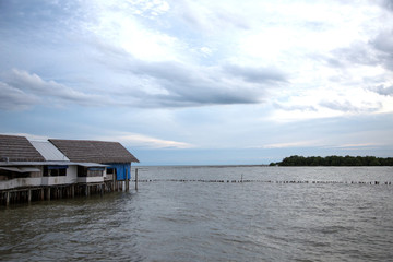 floating house and boat on the river in asian