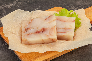 Raw pollock fish fillet for cooking