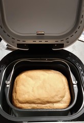 Bread machine with freshly cooked ready-made bread