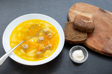 Meatball soup. Top view, copy space. Flavored, delicious soup on your table