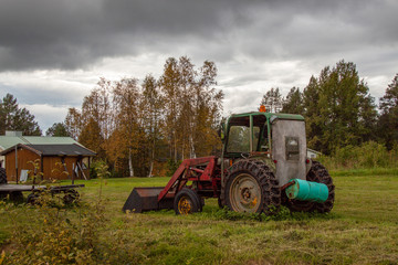 
Old tractor in the meadow