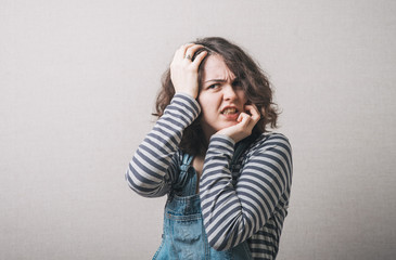 Young woman looking scared