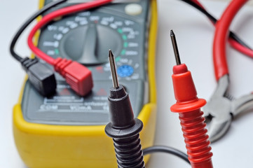 electrical tester terminal block and nippers. on a light background.Close-up.