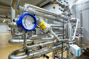 Craft beer brewing equipment in brewery
Metal tanks, alcoholic drink production