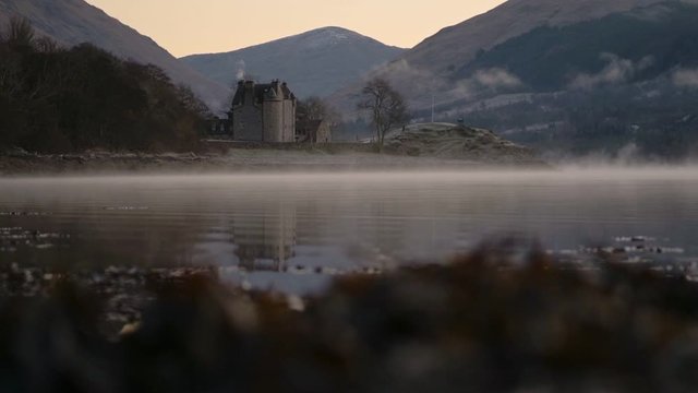 The Old Castle Of Dunderave  Situated On The Coastline Of Loch Fyne In Argyll and Bute, Highlands of Scotland. -wide shot