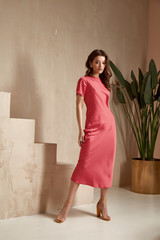 Pretty beautiful woman brunette hair natural makeup wear fashion clothes red print silk long dress...