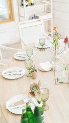 white decor for a wedding table and table setting
