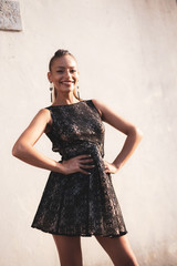 smiling model posing in the street