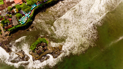Top aerial view of Tanah Lot temple bay in Bali, Indonesia.