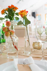 light decor of a festive table in a bright interior