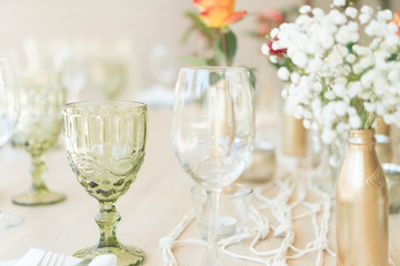 light decor of a festive table in a bright interior