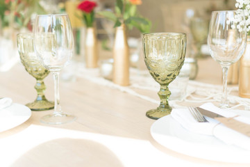 light decor of a festive table in a bright interior