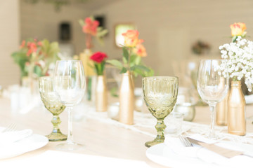 light decor of a festive table in a bright interior