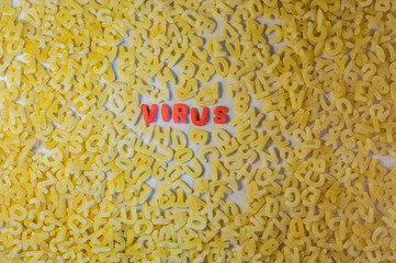 Virus word with alphabet letters soup pasta. Pandemic and infection concept.