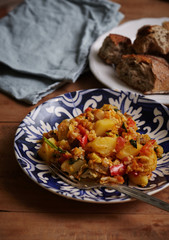 Delicious stew of potatoes, peppers, cauliflower, carrots, onions and green parsley.