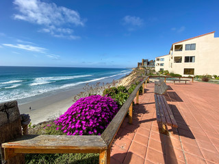 Obraz premium A view of Solana Beach from the top of the cliff with wood bench , California, USA