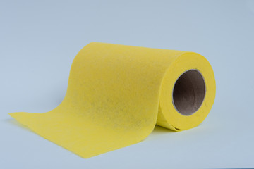 Yellow microfiber cloth for cleaning in a roll.