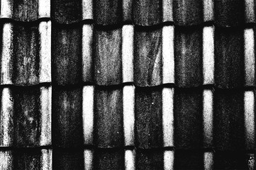 Distress old texture of roof tile. Black and white grunge background.