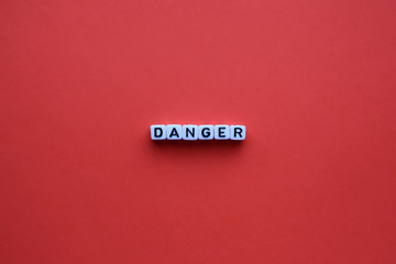 Danger word on a red background
