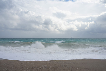 Storm Mediterranean Sea blue sea with clouds and high waves