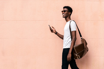 African man using mobile phone