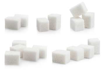Large collection of sugar cubes heaps, isolated on white background