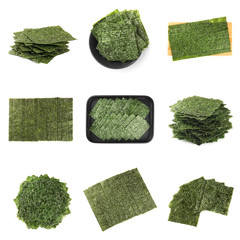 Tasty seaweed sheets on white background