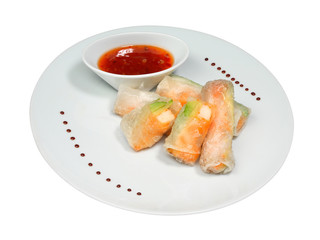 Close up of streamed fresh rice flour rolls with shrimps and avocado